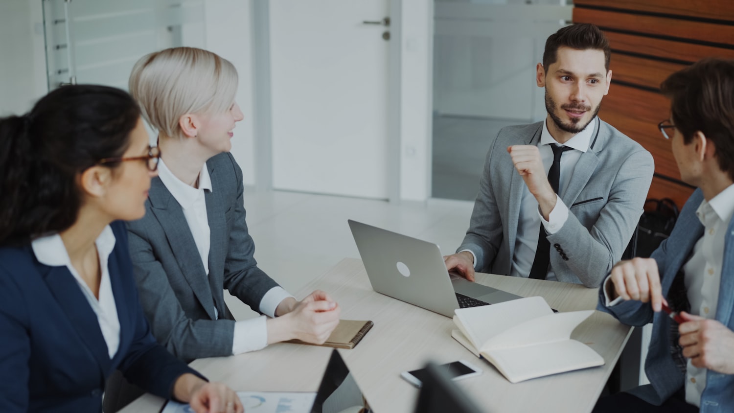 Mortgage brokers meeting with a client